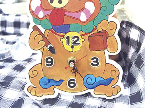 金沙鎮高粱老街風獅爺文化季活動，推出兩項DIY活動，17日為「彩繪風獅爺時鐘」；18日則為「EVA筆筒風獅爺」，一律採現場排隊體驗，一人限領一份，領完為止。（陳麗妤攝）