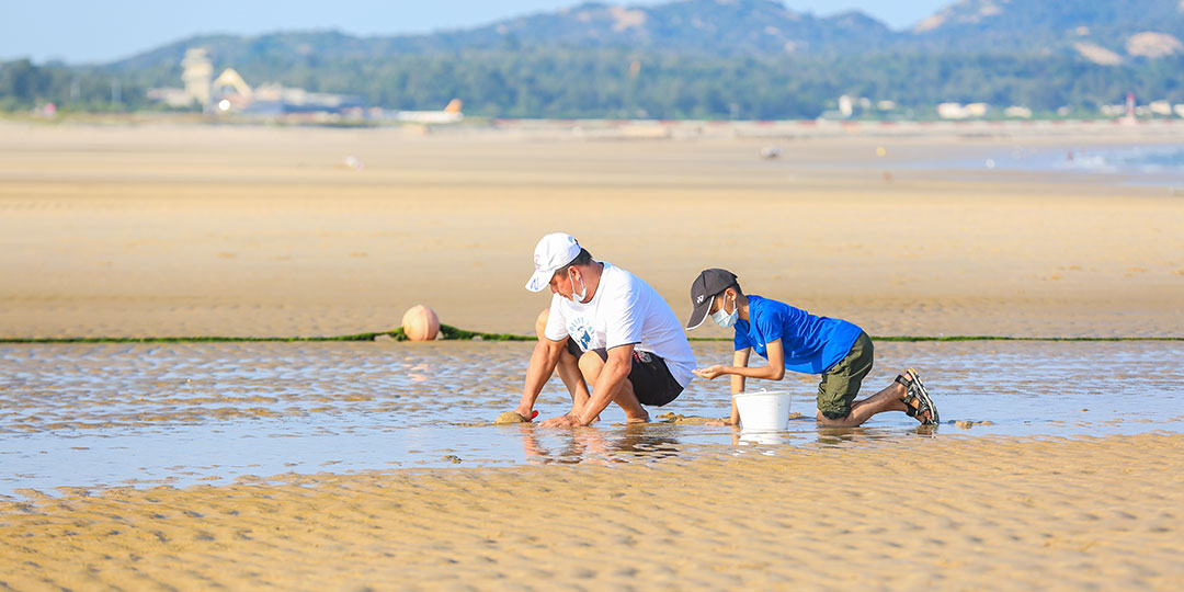 Clam digging at the beach